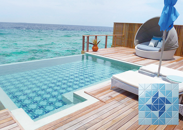 royal blue pool tiles with geometric shapes.jpg