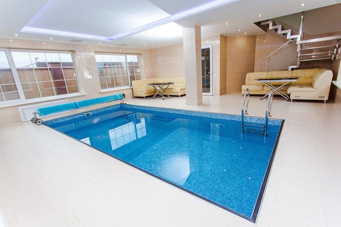 indoor lap pool with blended blue pool mosaic tiles.jpg